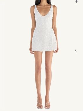 knee length dresses for ladies Celeste Mini Sequin Bow Dress – OUTCAST main image 1